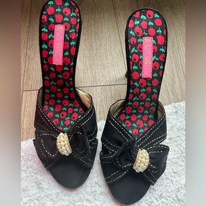 Betsy Johnson Catalyna black heel with gold stitching, pearl detail, pink bottom